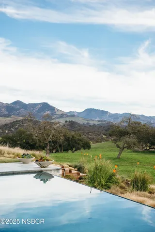 a view of a lake with mountains in the background