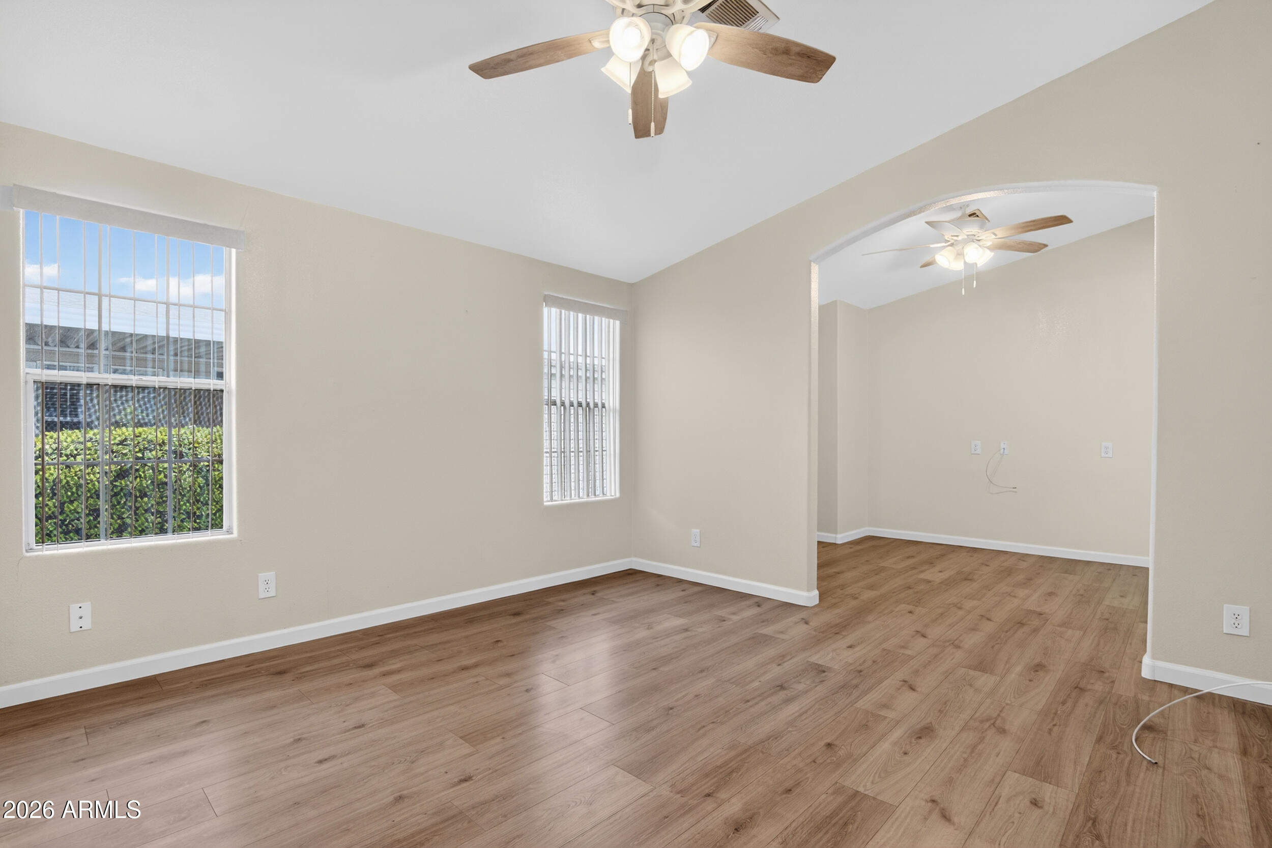 2550 South Ellsworth Road, Unit 396 Mesa, AZ 85209 - Photo 12 of 29 wooden floor in an empty room with a window