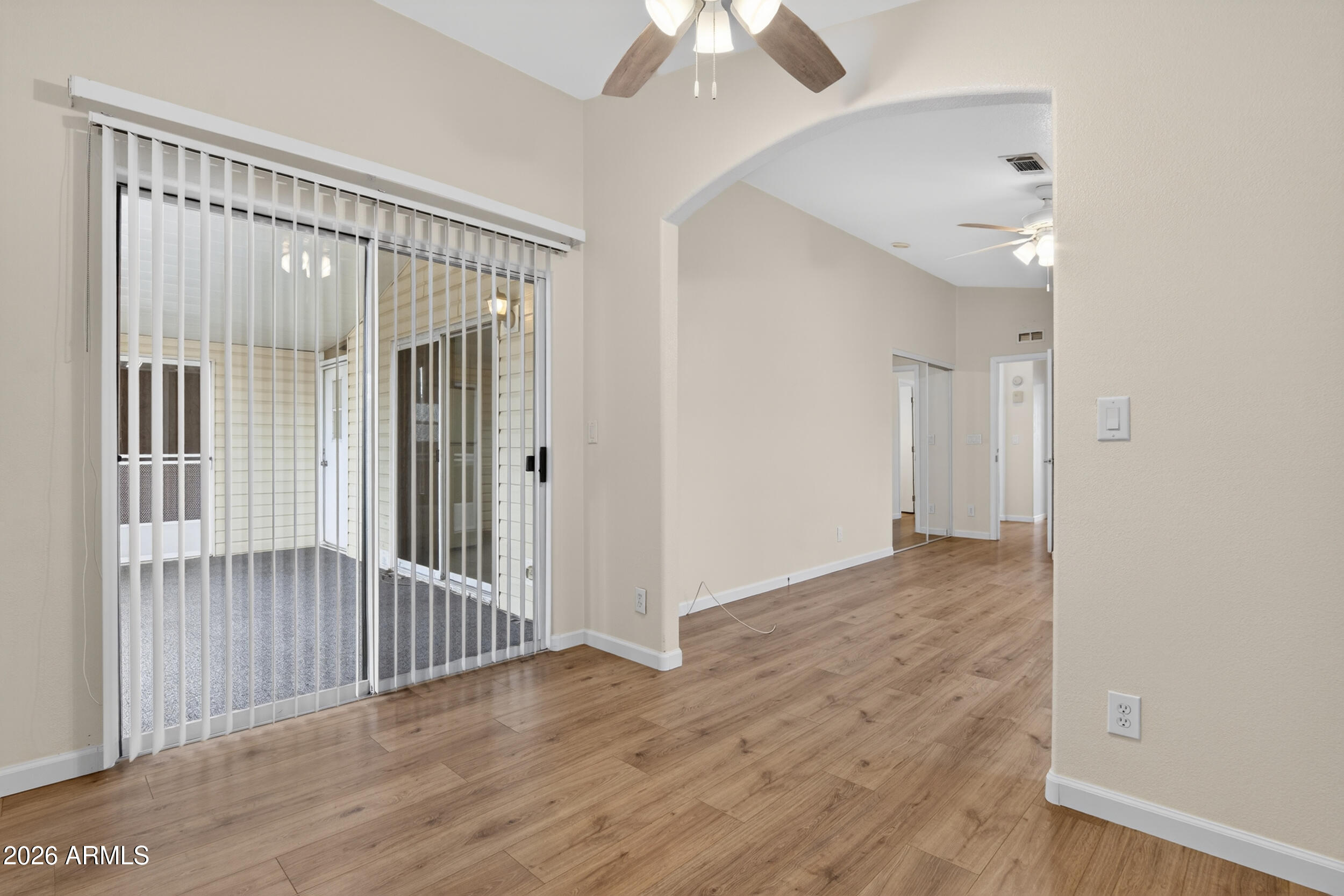2550 South Ellsworth Road, Unit 396 Mesa, AZ 85209 - Photo 16 of 29 a view of a hallway with wooden floor