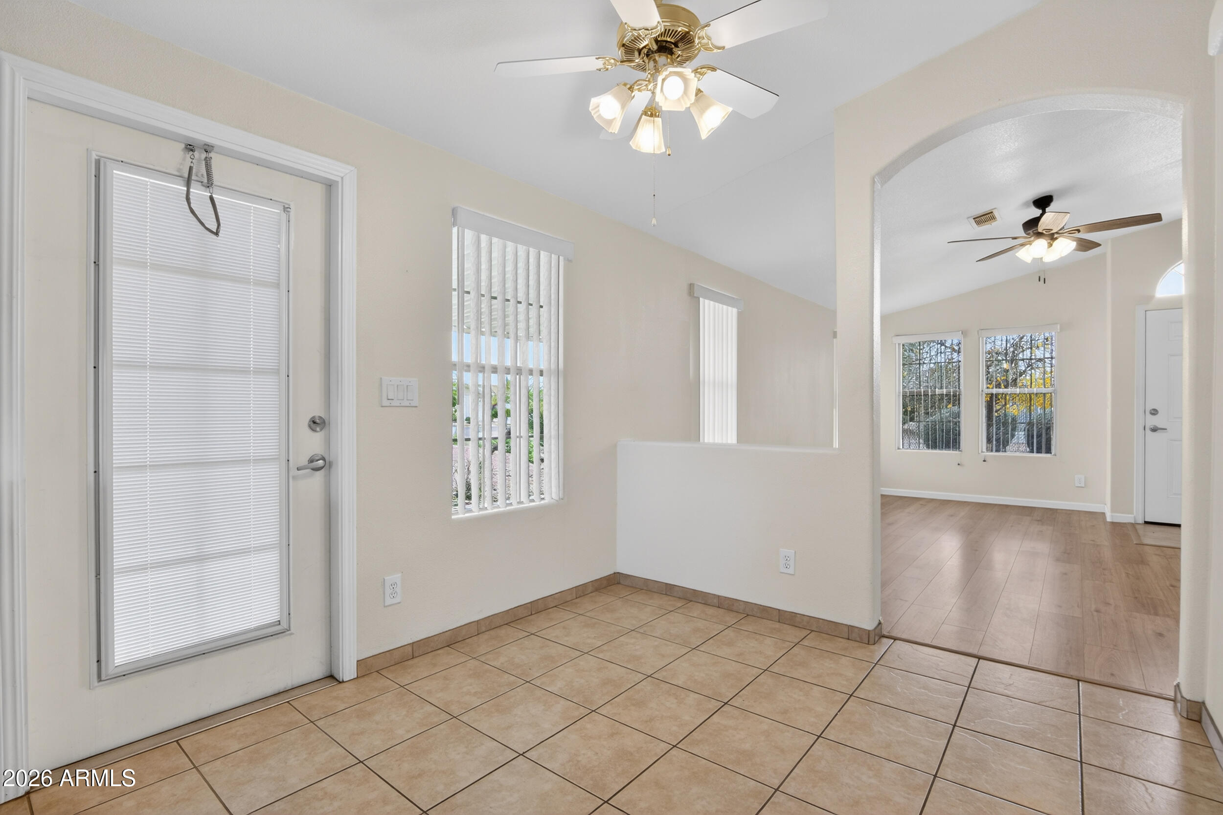2550 South Ellsworth Road, Unit 396 Mesa, AZ 85209 - Photo 8 of 29 a view of an empty room with a window