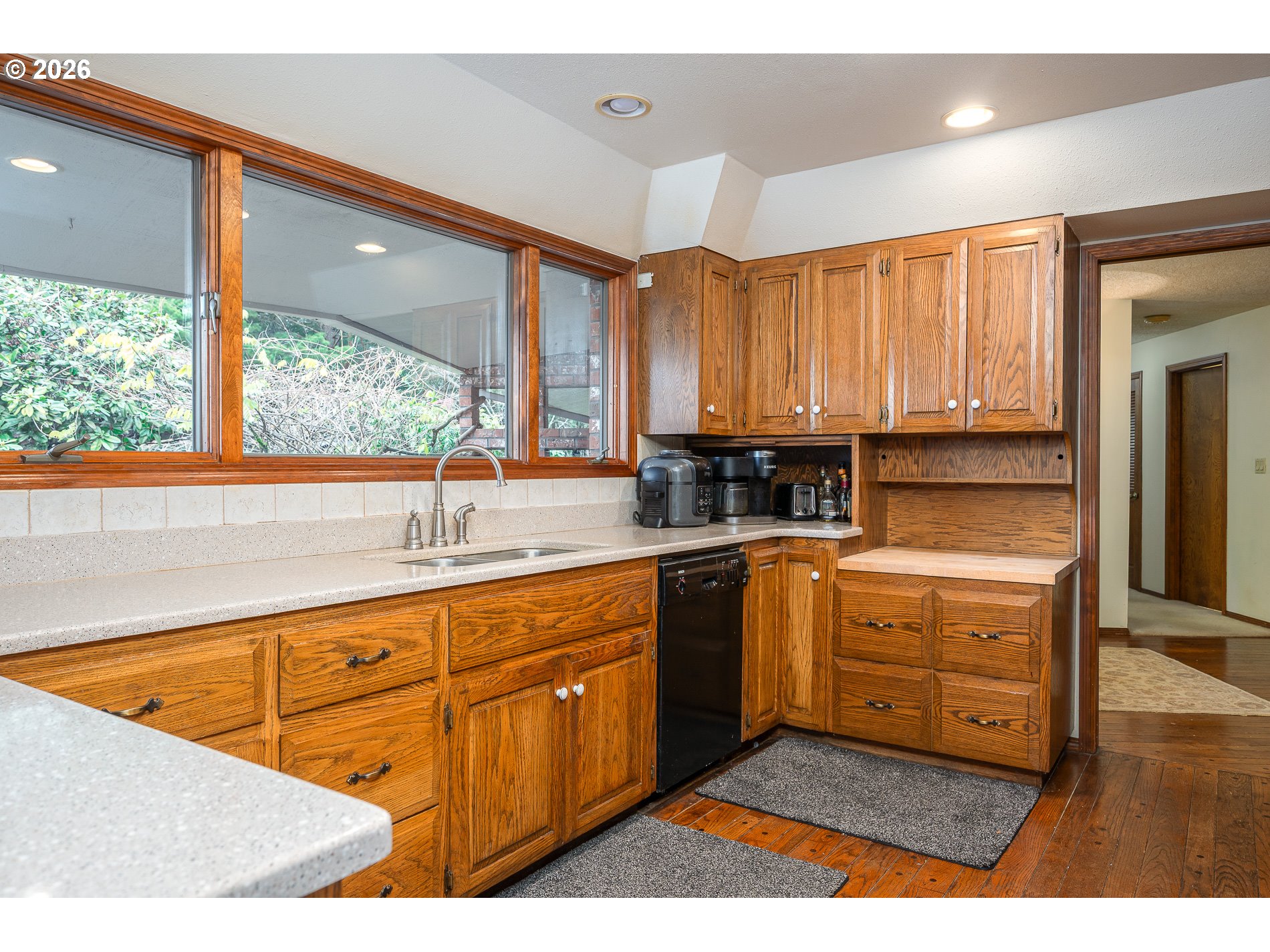 27572 South Kinzy Road Estacada, OR 97023 - Photo 11 of 47 a kitchen with stainless steel appliances granite countertop a stove a sink and a microwave