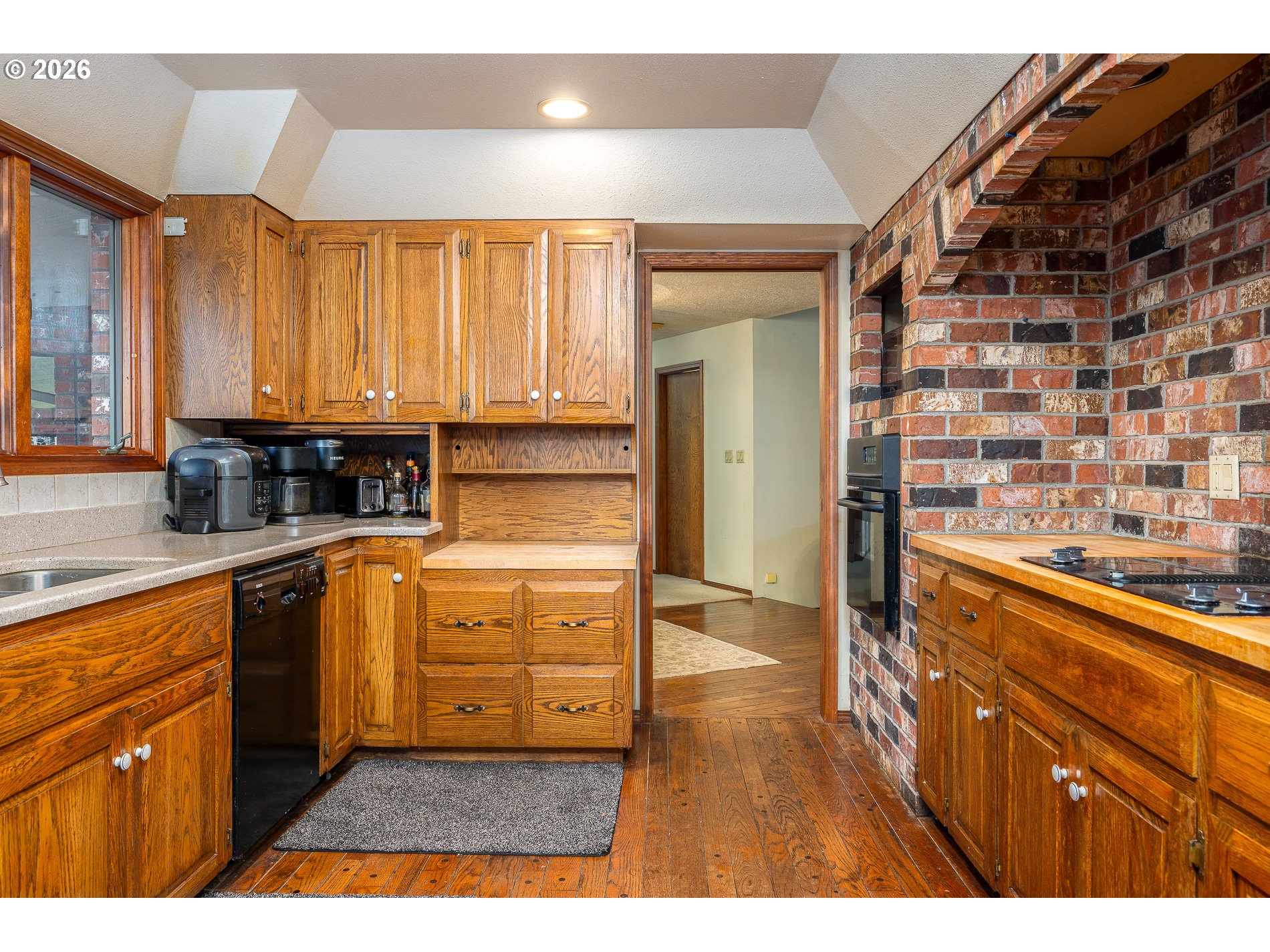 27572 South Kinzy Road Estacada, OR 97023 - Photo 12 of 47 a kitchen with stainless steel appliances granite countertop a stove a sink and a microwave