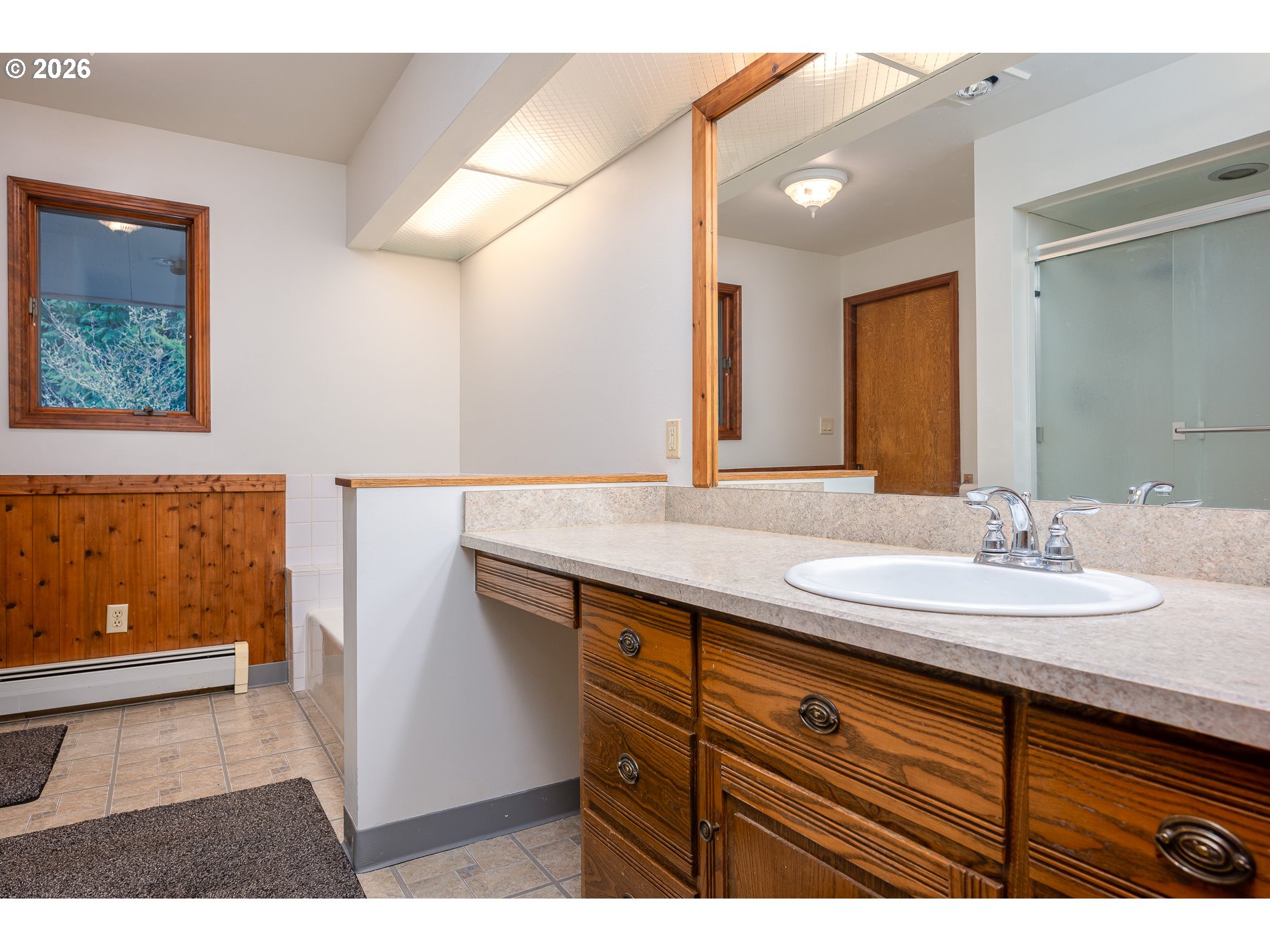 27572 South Kinzy Road Estacada, OR 97023 - Photo 16 of 47 a bathroom with a sink and a mirror
