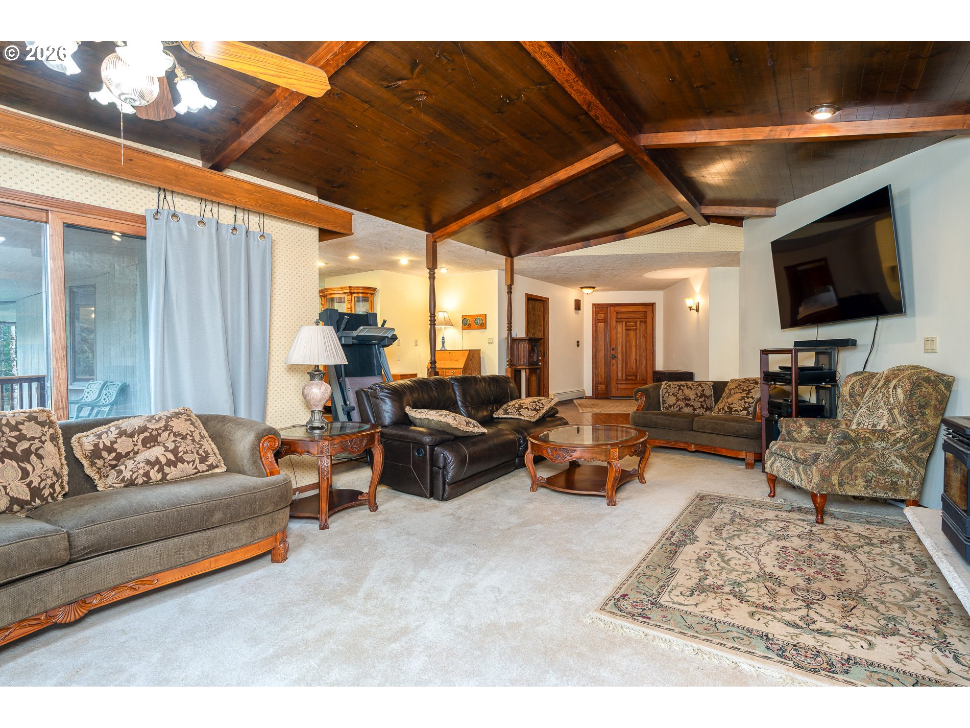 27572 South Kinzy Road Estacada, OR 97023 - Photo 3 of 47 a living room with furniture and a flat screen tv