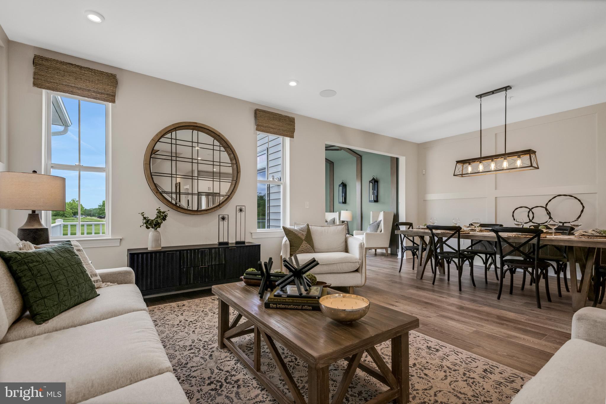 2 Baldwin Way Perkasie, PA 18944 - Photo 14 of 35 a living room with furniture a large window and a chandelier