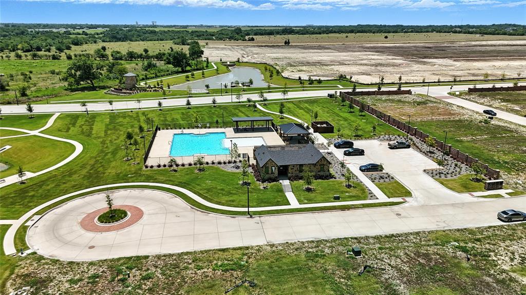 1246 Stockton Trail Red Oak, TX 75154 - Photo 20 of 29 an aerial view of a house with a ocean view