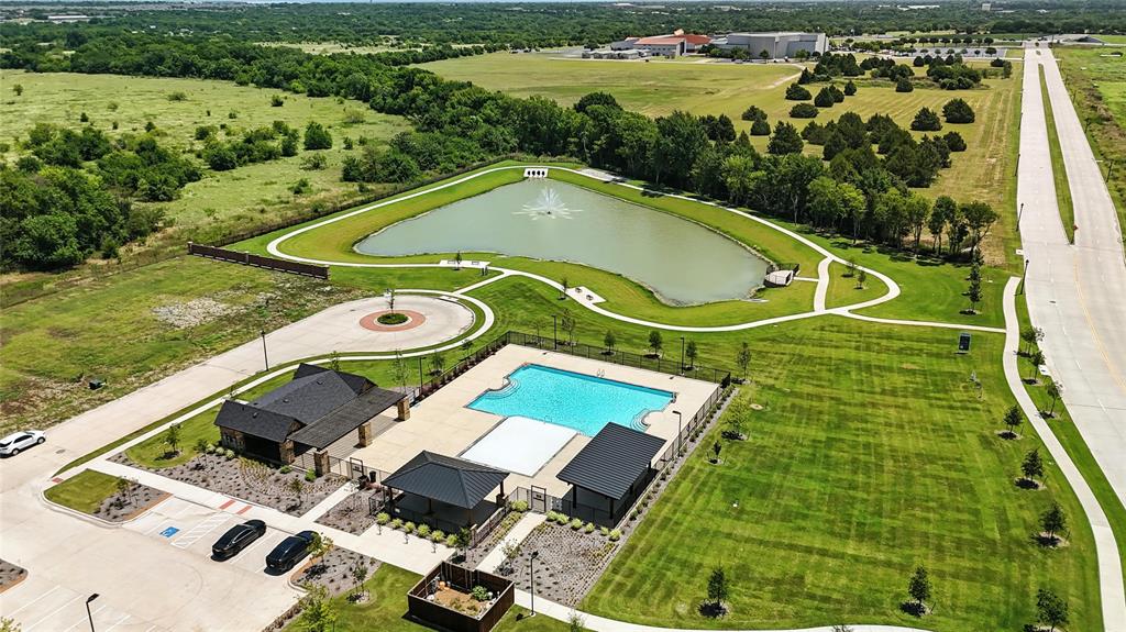 1246 Stockton Trail Red Oak, TX 75154 - Photo 21 of 29 a view of swimming pool with a garden