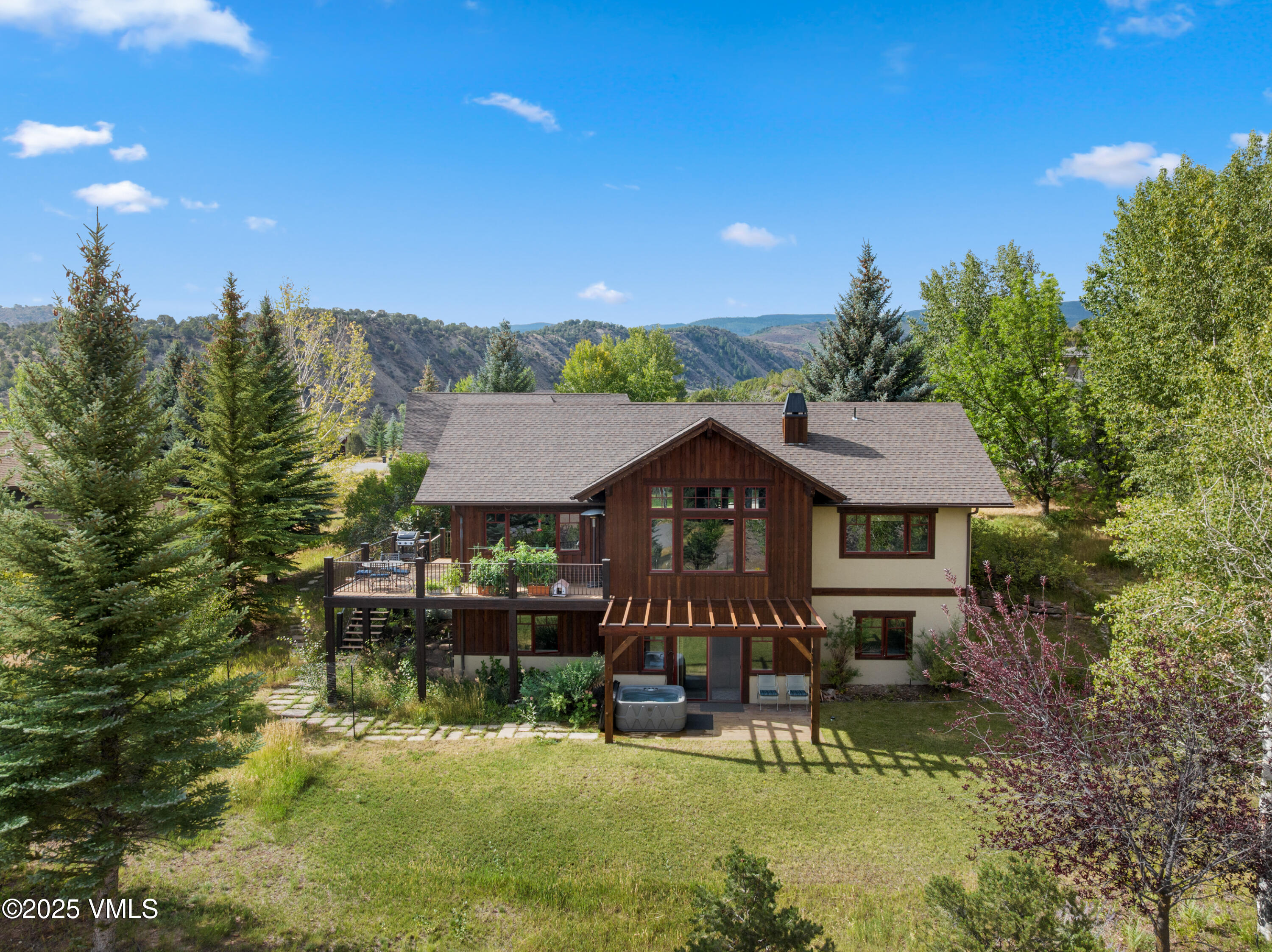 51 Silver Spur Eagle, CO 81631 - Photo 2 of 59 an aerial view of a house with swimming pool garden and patio