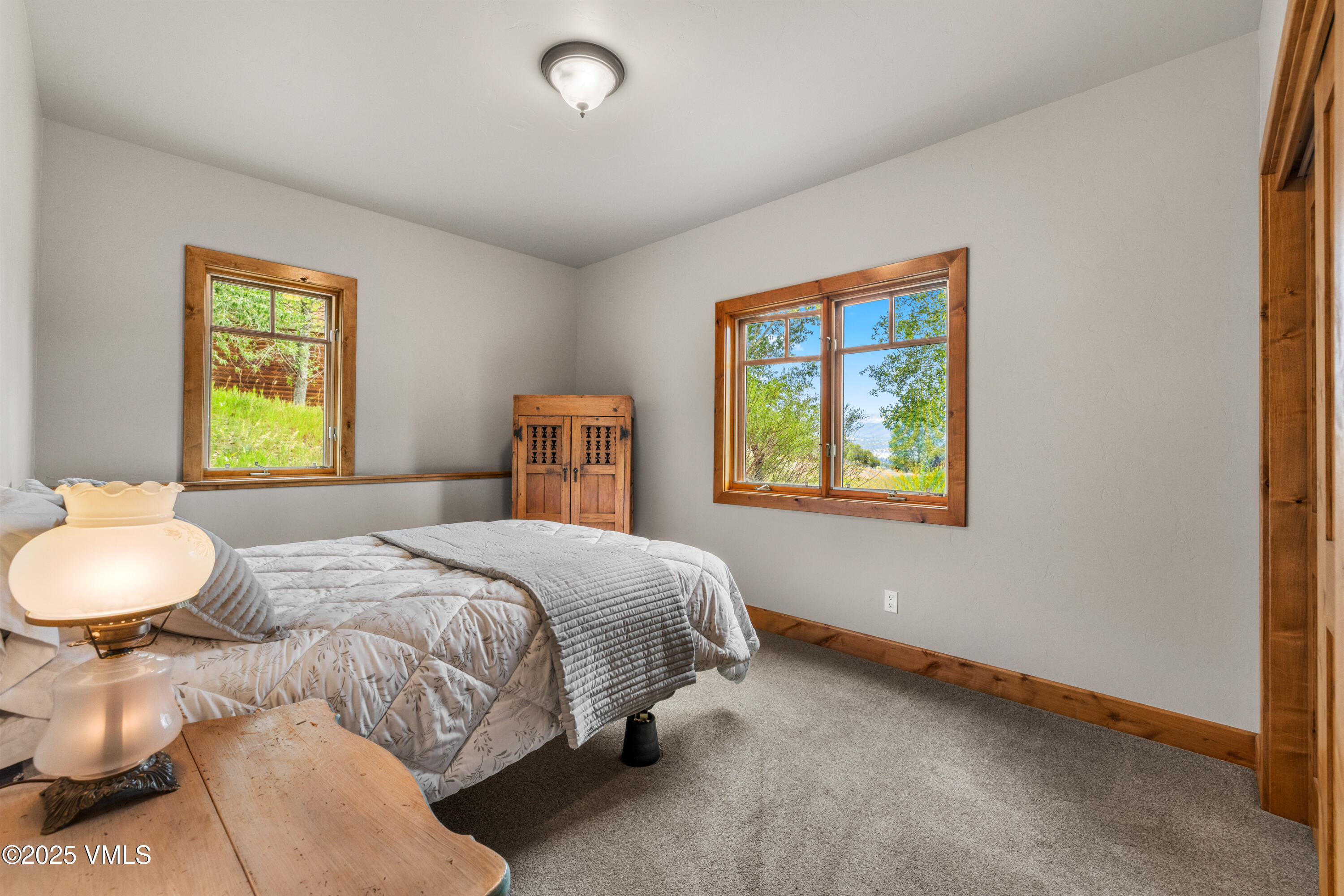 51 Silver Spur Eagle, CO 81631 - Photo 32 of 59 a bedroom with a bed and a window
