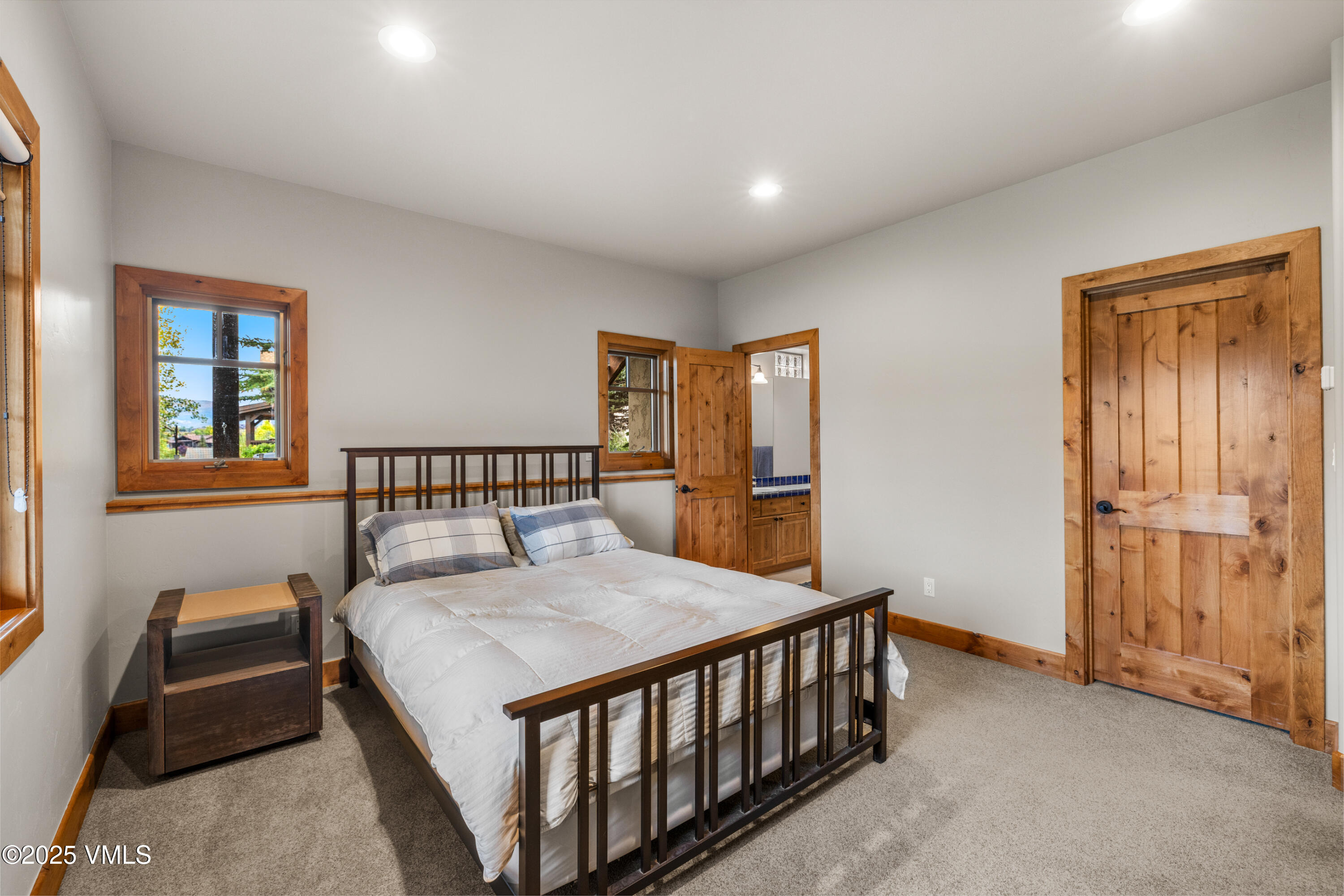 51 Silver Spur Eagle, CO 81631 - Photo 38 of 59 a bedroom with furniture and a window