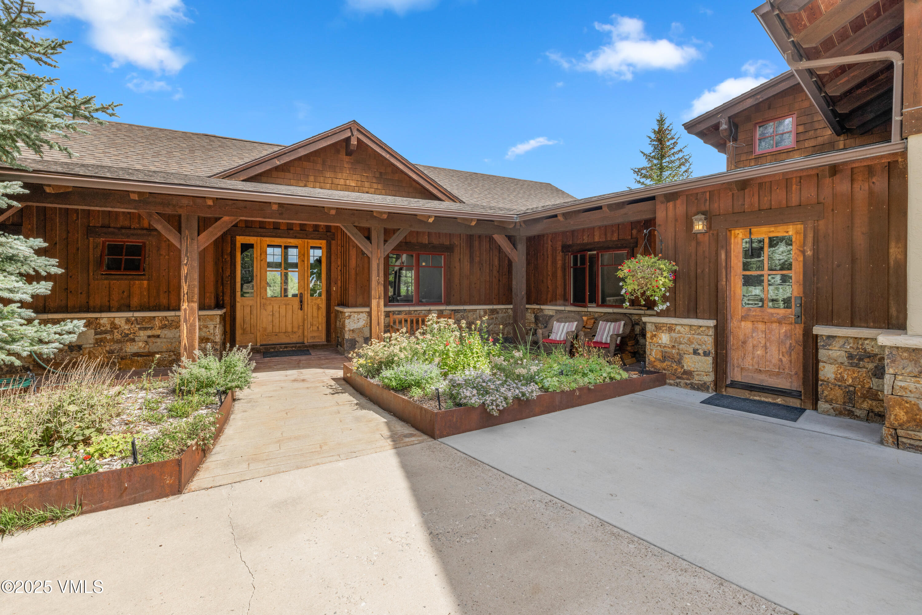 51 Silver Spur Eagle, CO 81631 - Photo 6 of 59 a front view of a house with garden