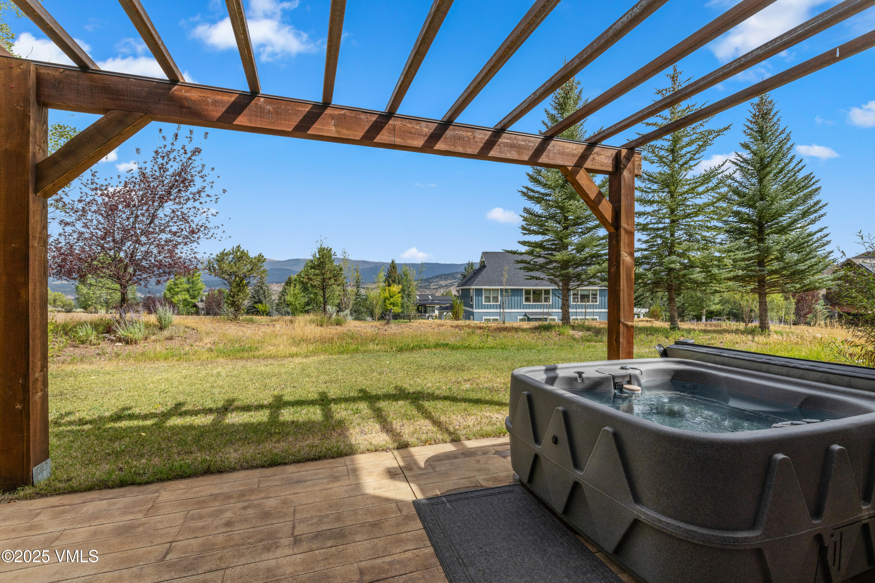 51 Silver Spur Eagle, CO 81631 - Photo 8 of 59 a view of swimming pool with outdoor seating and a yard