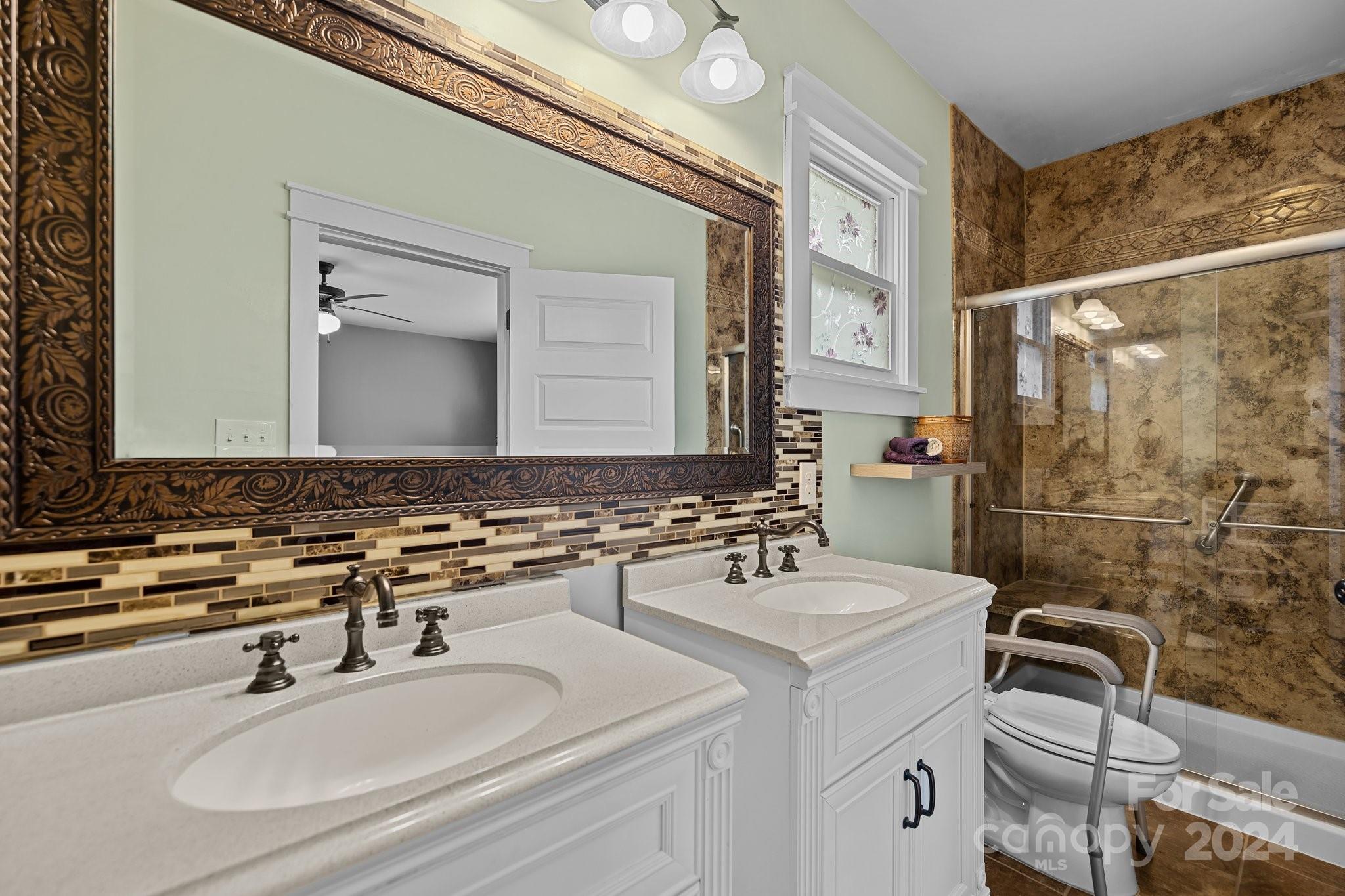 284 8th Avenue Cramerton, NC 28032 - Photo 16 of 29 a bathroom with a sink and a mirror