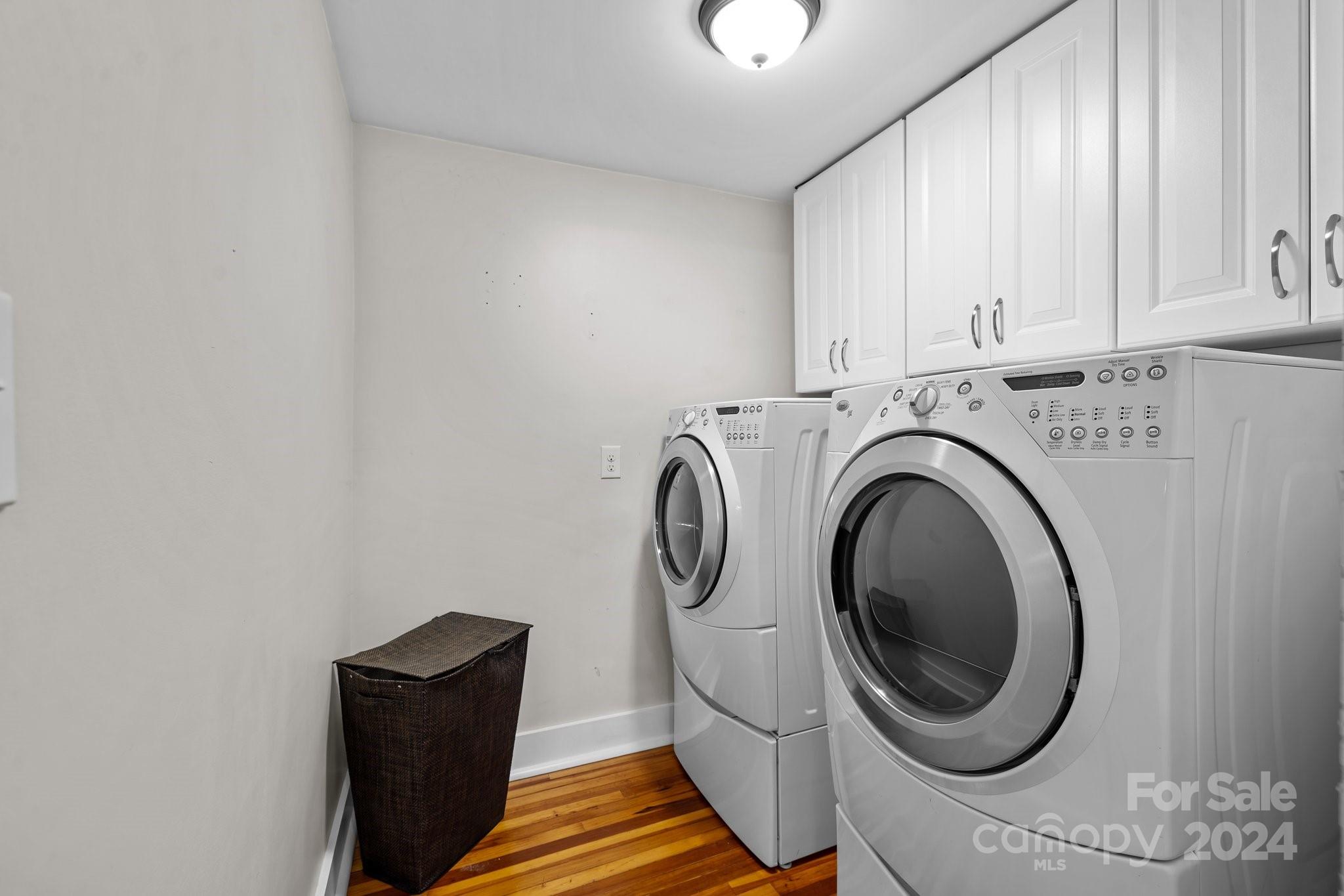 284 8th Avenue Cramerton, NC 28032 - Photo 20 of 29 a close view of a utility room with dryer and washer