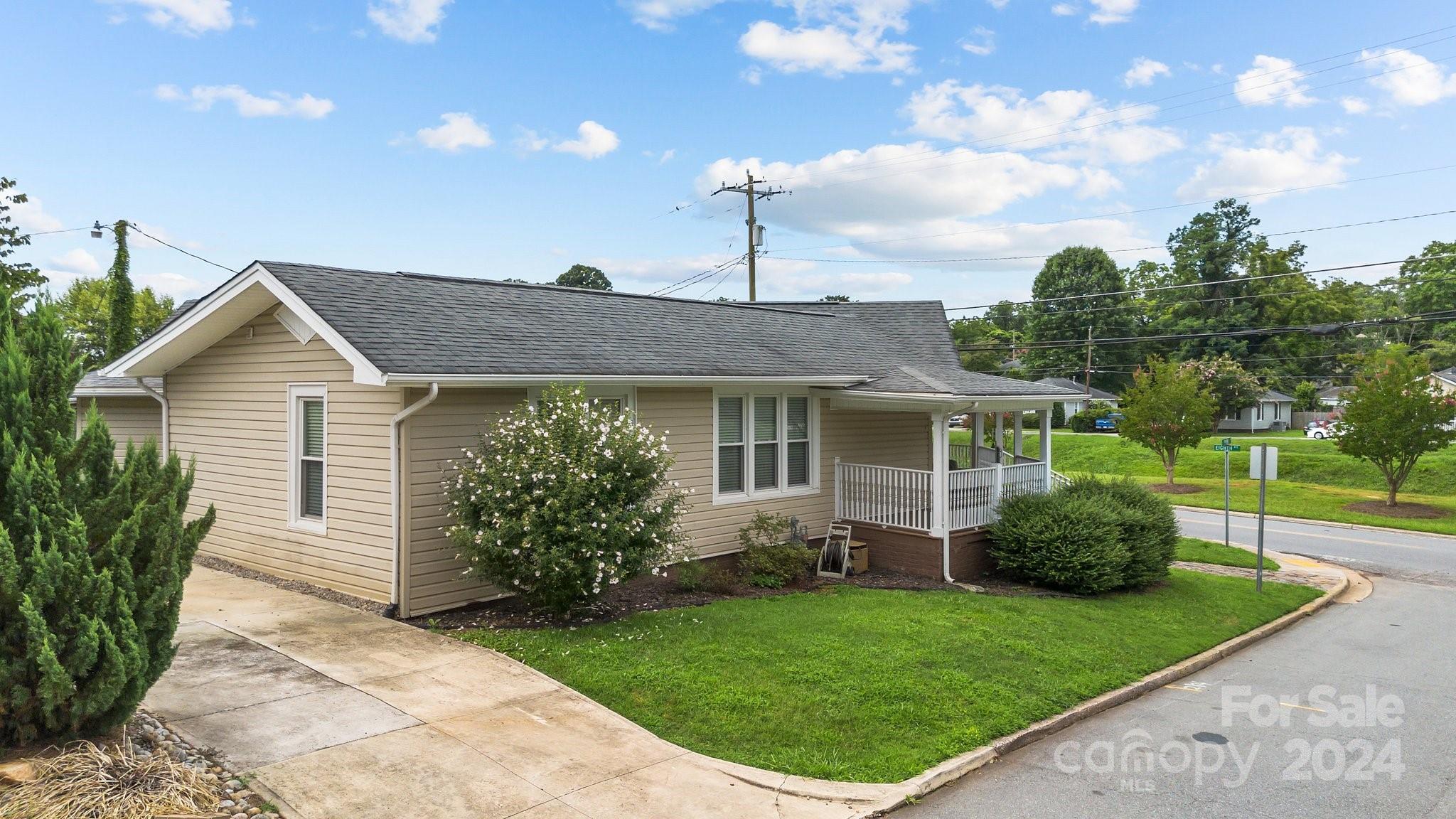 284 8th Avenue Cramerton, NC 28032 - Photo 28 of 29 a front view of house with a garden