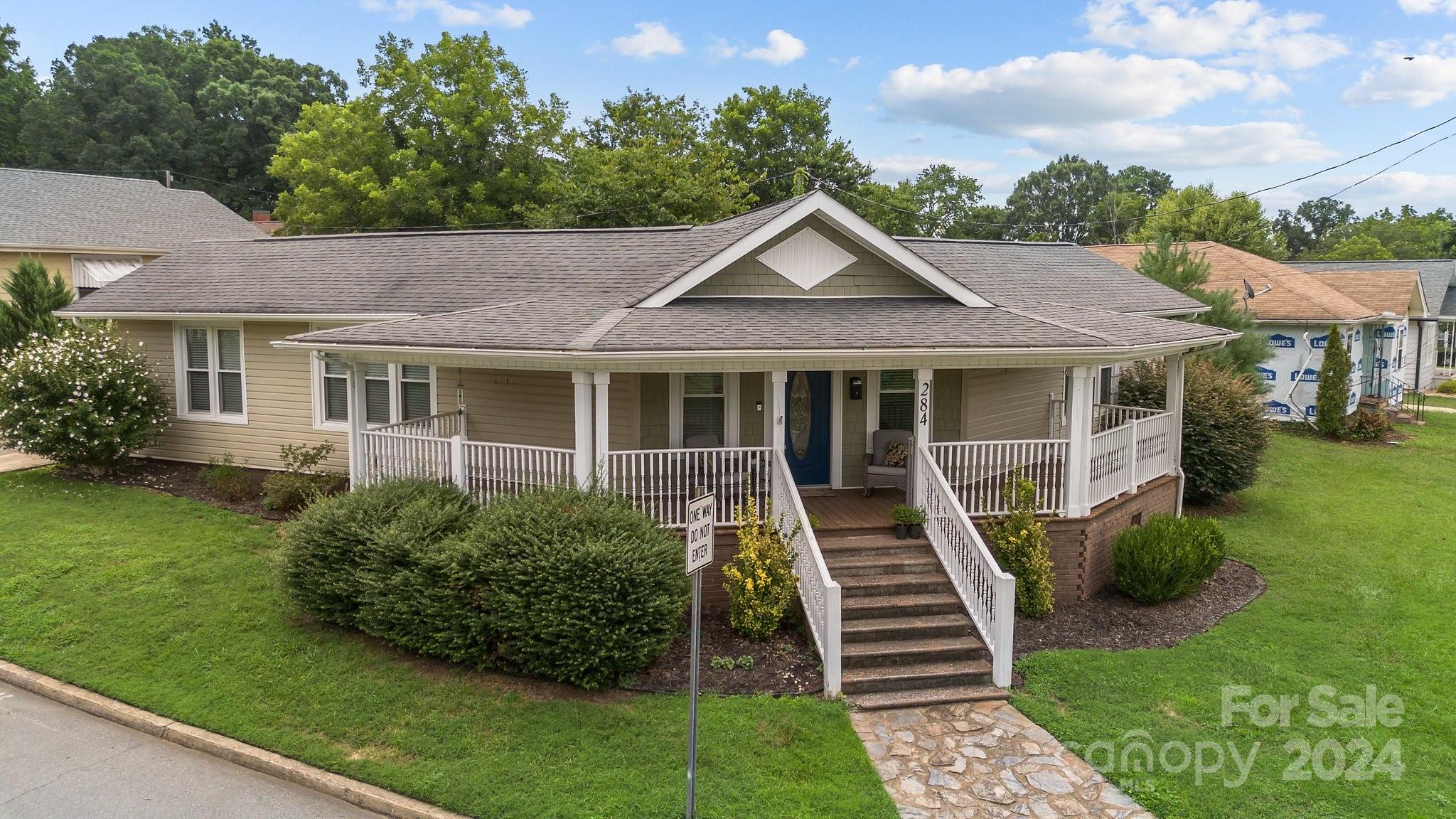 284 8th Avenue Cramerton, NC 28032 - Photo 29 of 29 a front view of a house with a yard