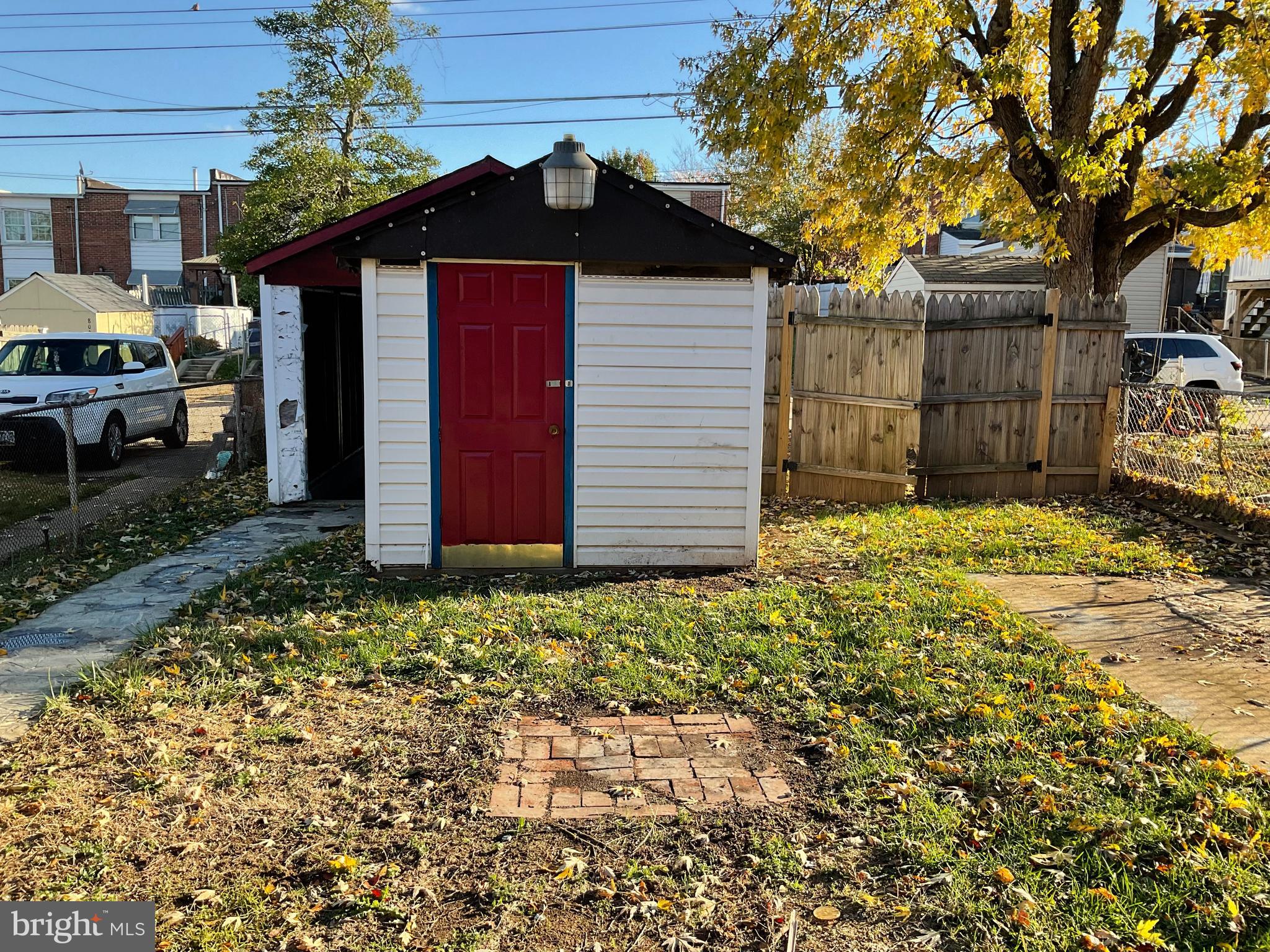 8029 Lansdale Road Baltimore, MD 21224 - Photo 29 of 35 Rear fenced yard with detached shed