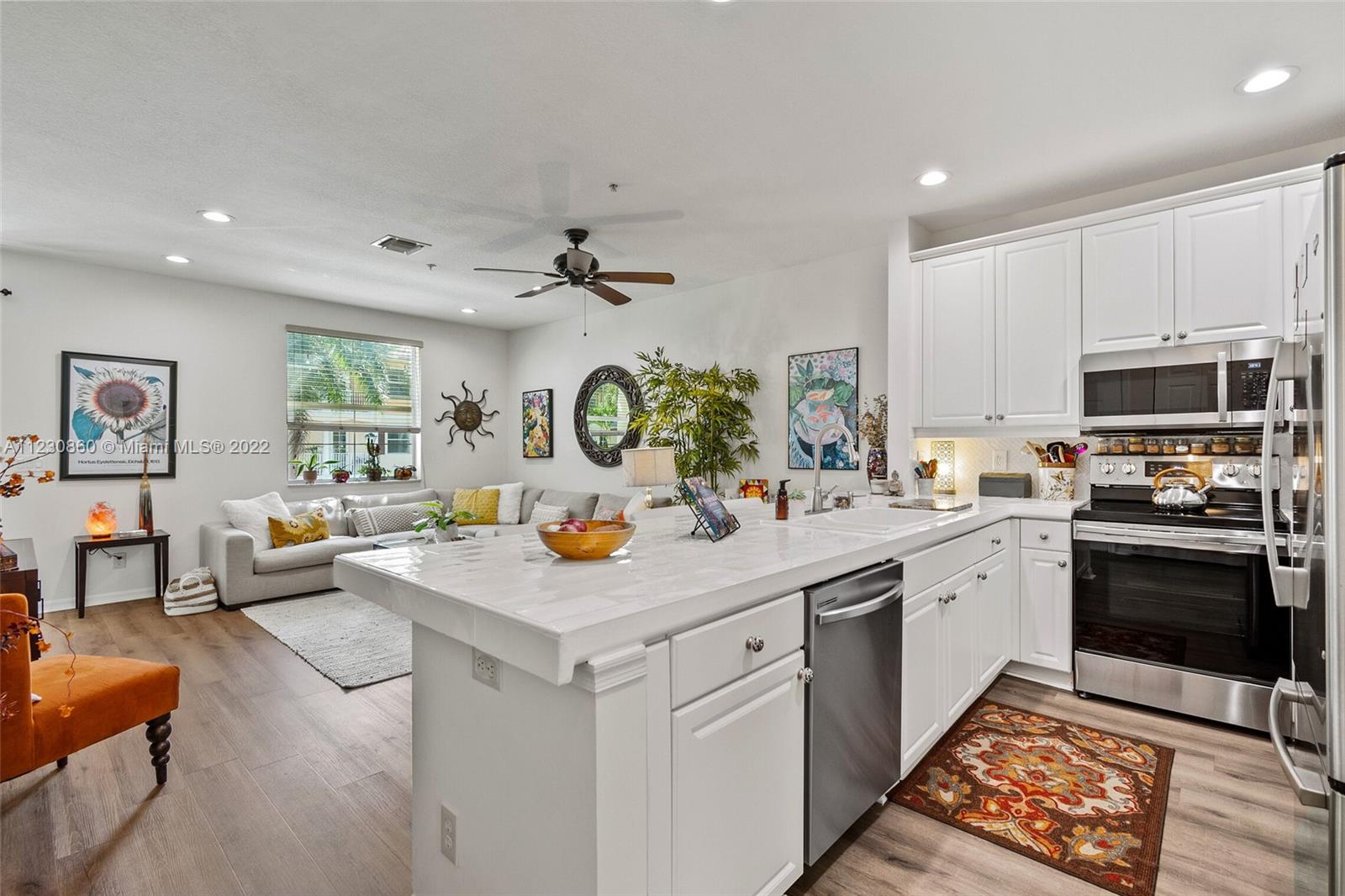 4332 Main Street Jupiter, FL 33458 - Photo 12 of 28 a view of a kitchen with a sink and microwave