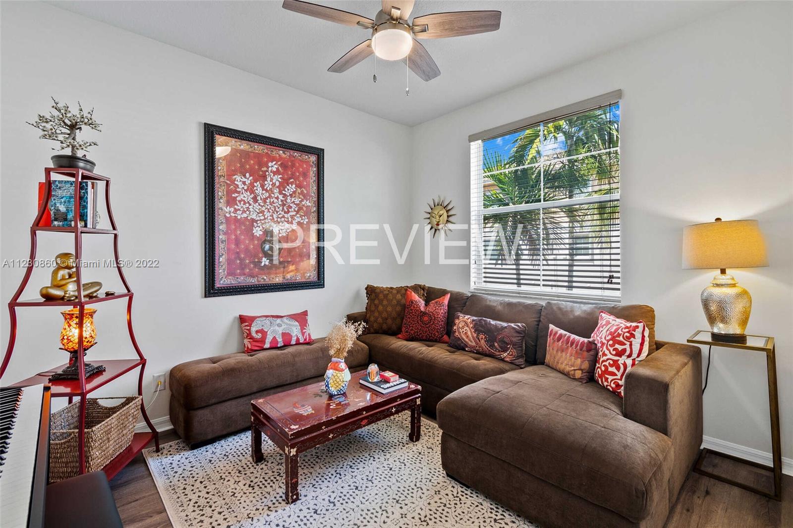 4332 Main Street Jupiter, FL 33458 - Photo 13 of 28 a living room with furniture and a large window