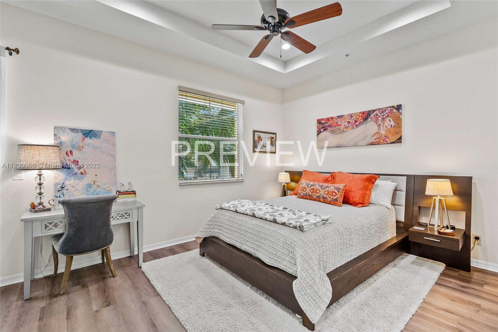 4332 Main Street Jupiter, FL 33458 - Photo 15 of 28 a bedroom with a large bed and a window