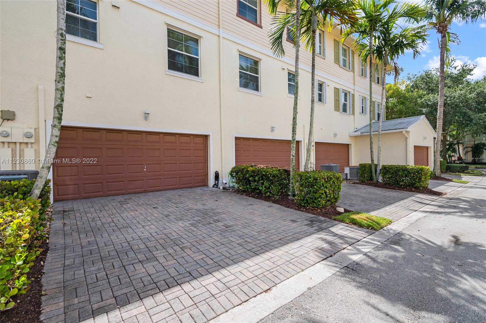 4332 Main Street Jupiter, FL 33458 - Photo 22 of 28 a view of a back yard of the house