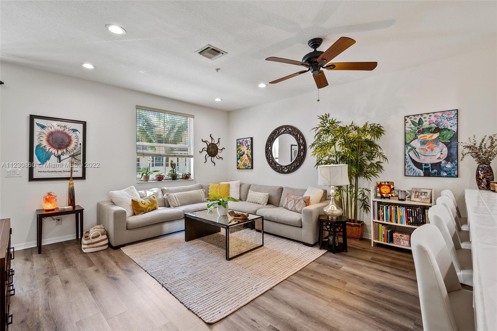 4332 Main Street Jupiter, FL 33458 - Photo 7 of 28 a living room with furniture and a large window