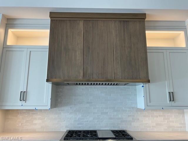 560 Rudder Road Naples, FL 34102 - Photo 18 of 23 a bathroom with a shower and a window