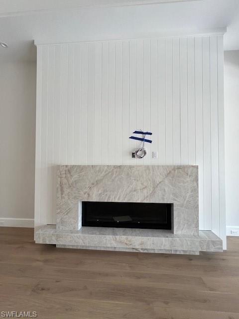 560 Rudder Road Naples, FL 34102 - Photo 19 of 23 a view of fireplace and wooden floor