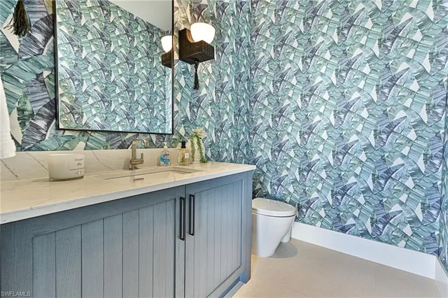 a bathroom with a sink and a toilet