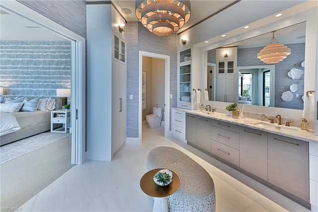 a bathroom with a sink double vanity and a mirror