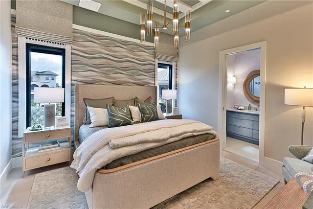 a bathroom with a sink a mirror and a shower