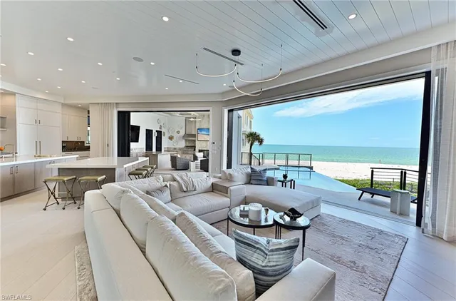 a living room with furniture and a table