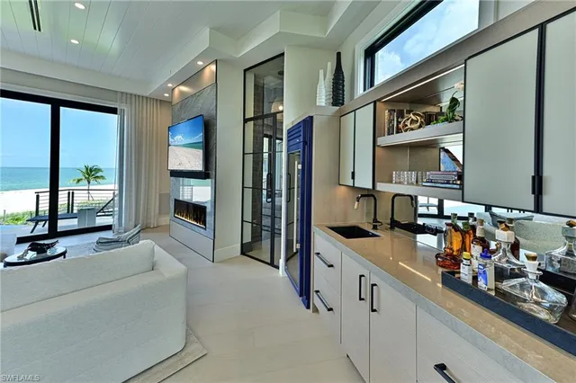 a hallway with a large window and cars