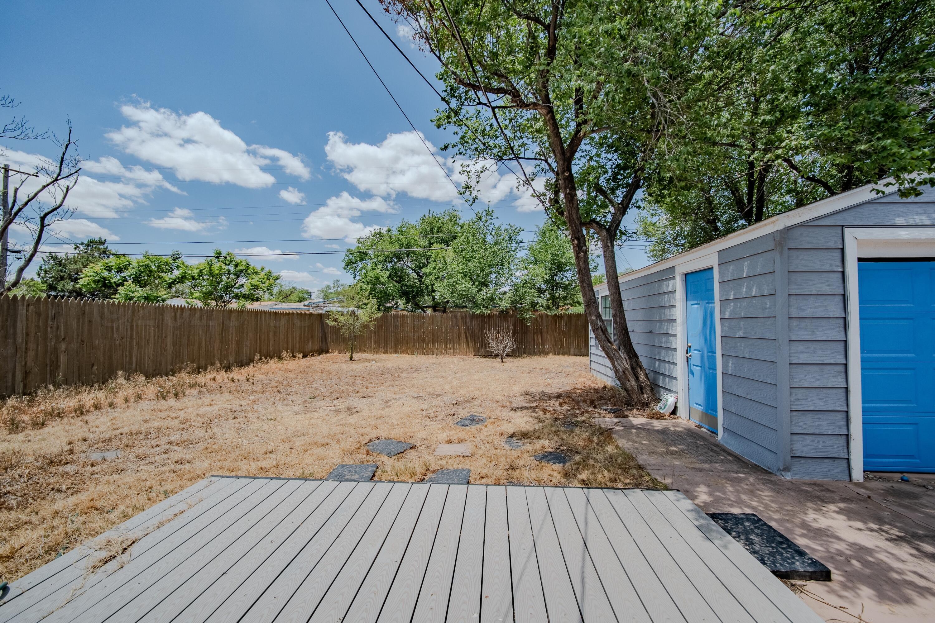 4014 Gables Street Amarillo, TX 79110 - Photo 14 of 14 a view of a backyard of the house