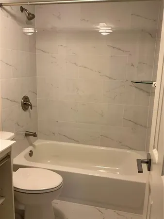 a bathroom with a sink and a toilet