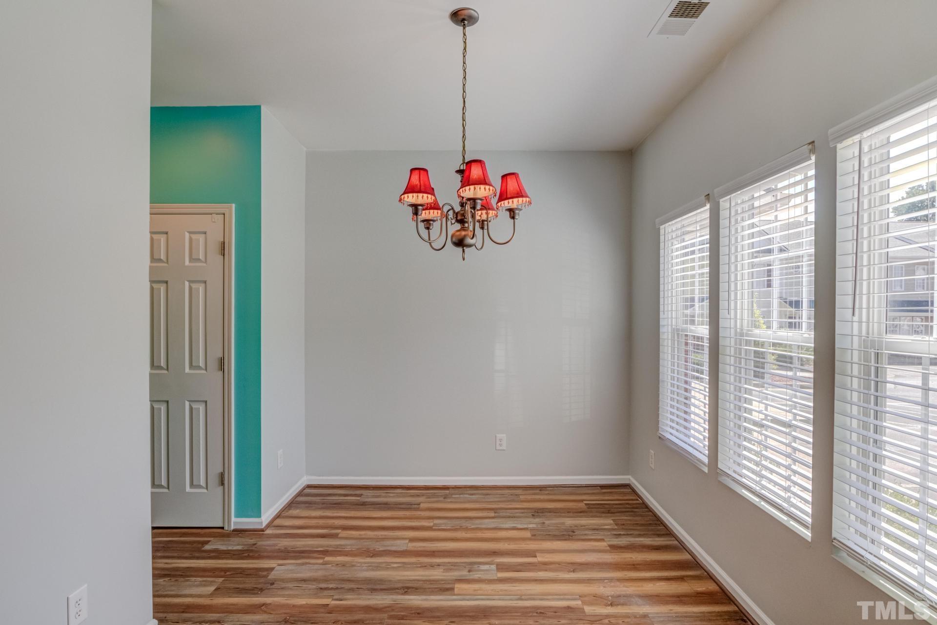 705 Glen Road, Unit 103 Garner, NC 27529 - Photo 6 of 25 a very nice looking room with a large window