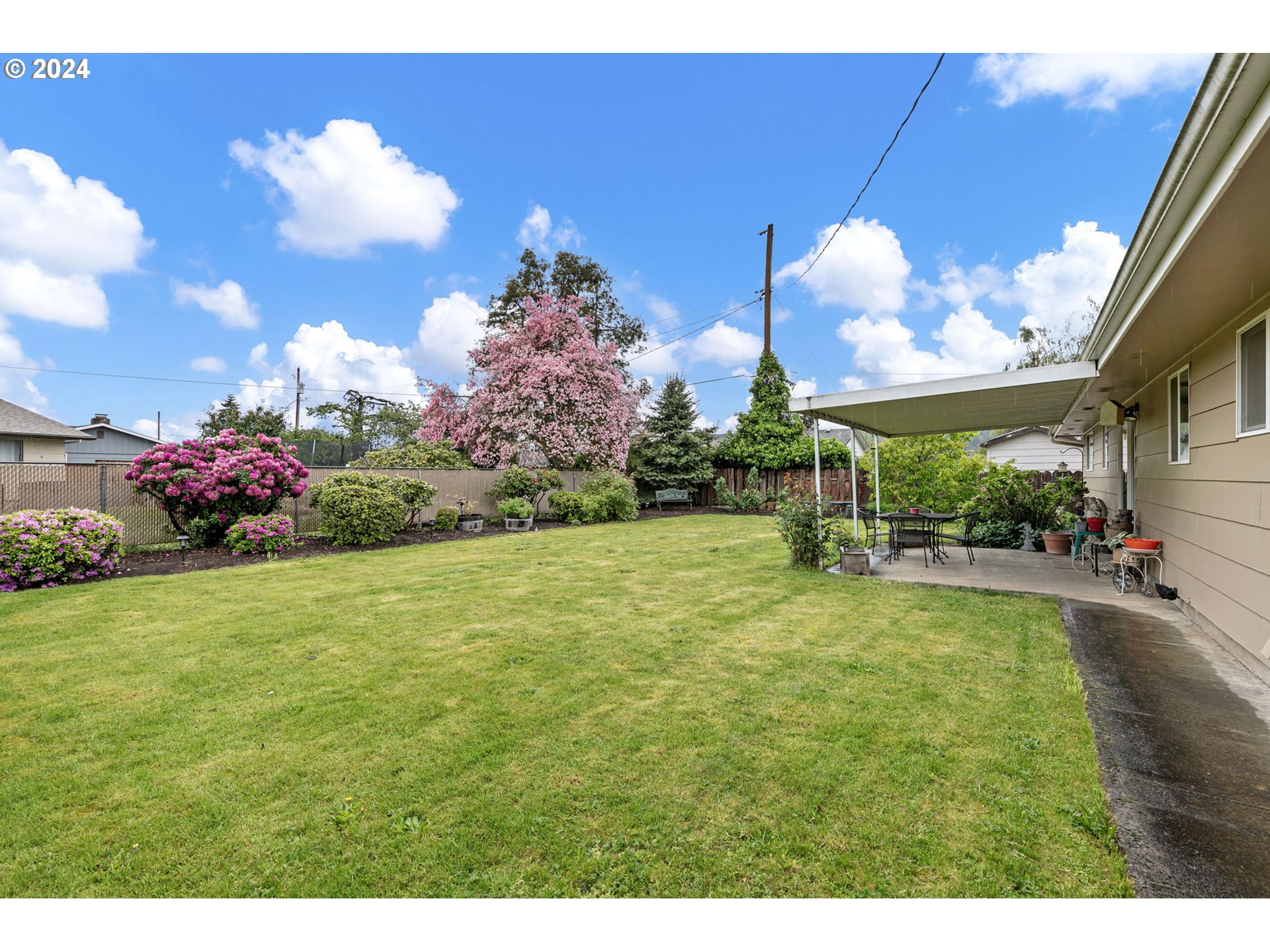 2484 19th Street Springfield, OR 97477 - Photo 23 of 30 a view of a fountain in front of house
