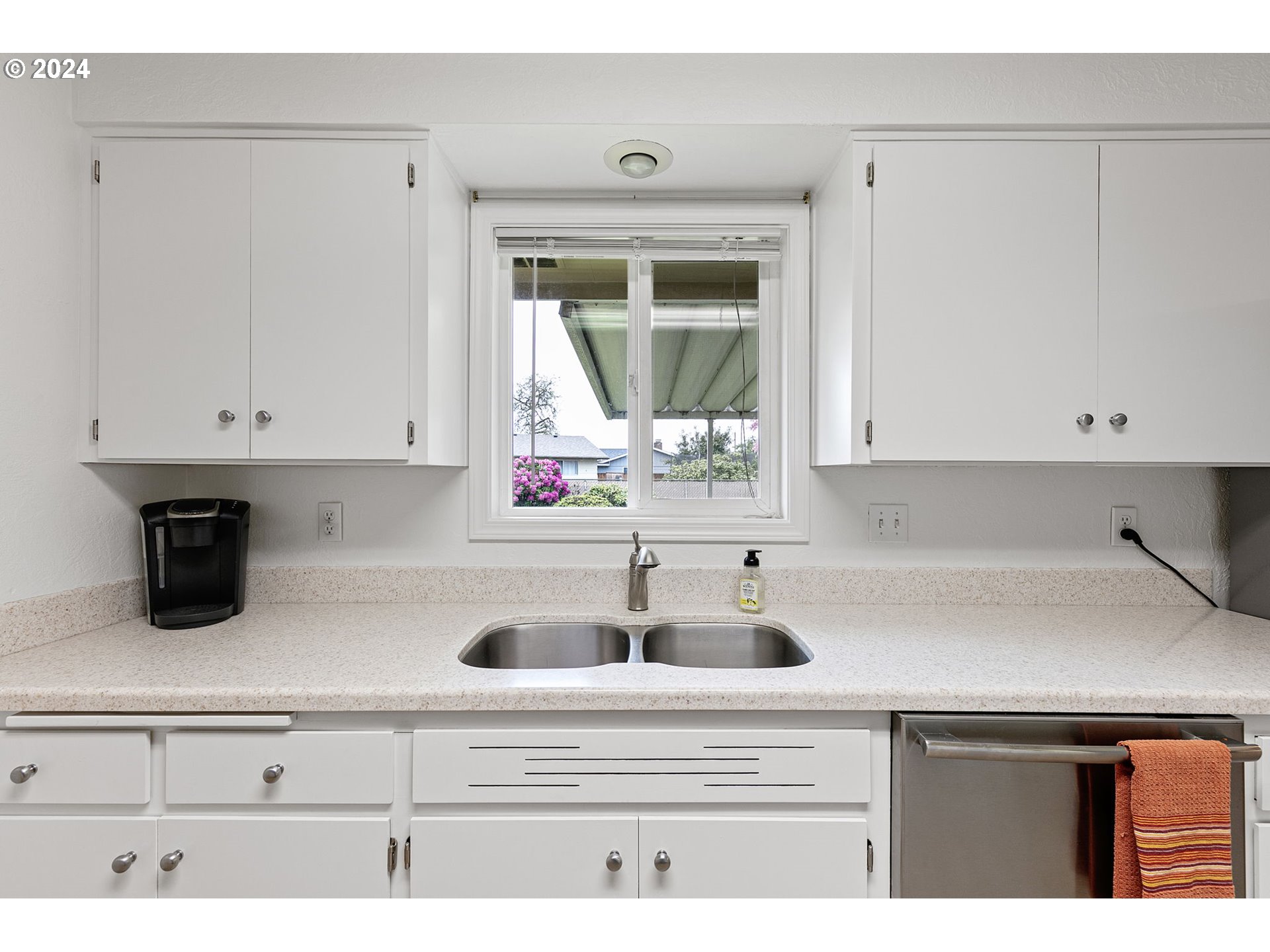 2484 19th Street Springfield, OR 97477 - Photo 8 of 30 a kitchen with a sink and cabinets