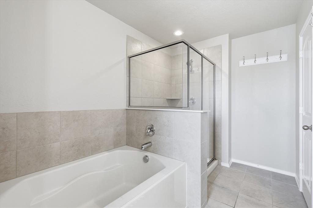 7708 Boat Wind Road Fort Worth, TX 76179 - Photo 12 of 23 Tub and Shower