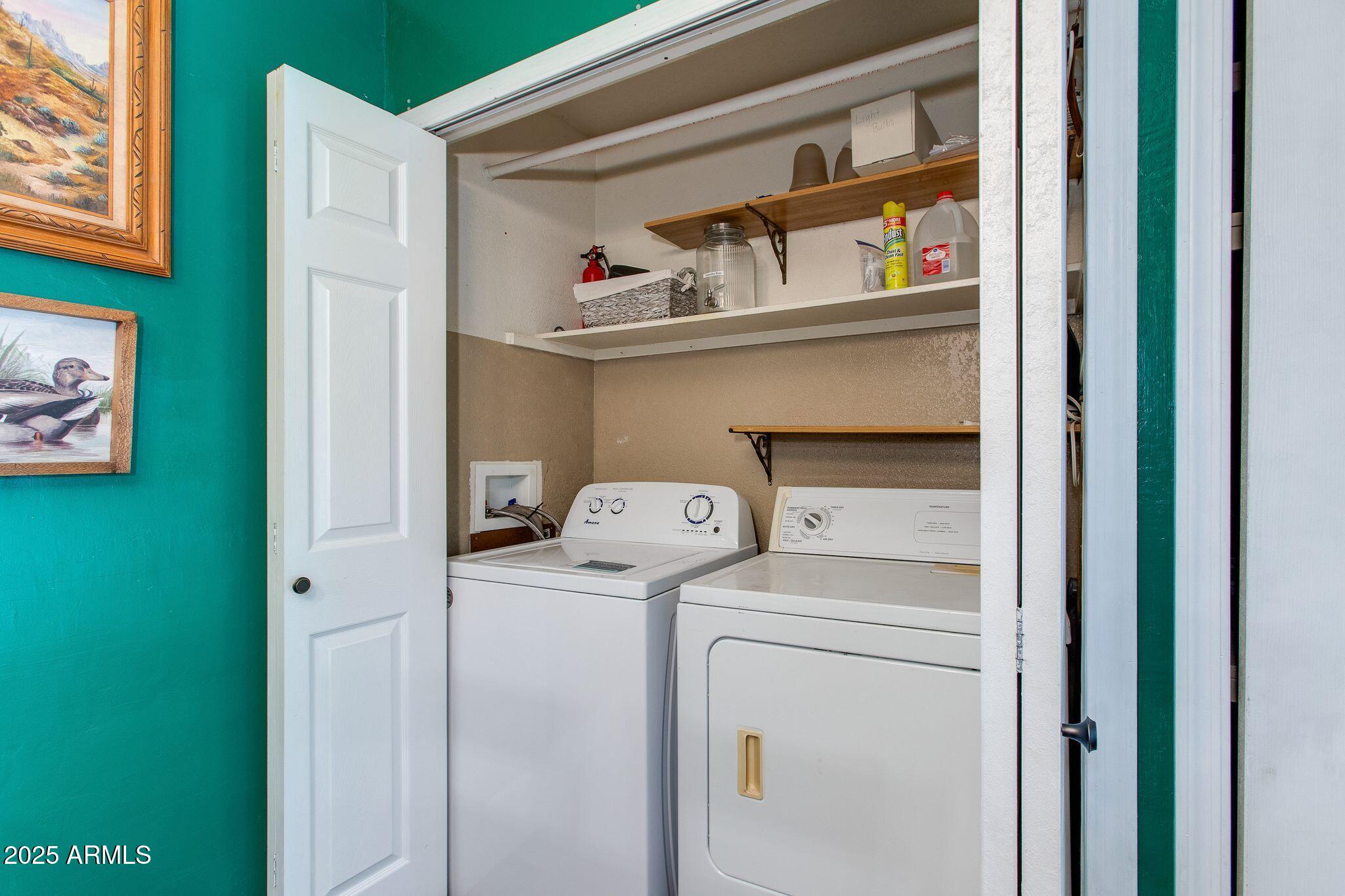 1645 West Baseline Road, Unit 1058 Mesa, AZ 85202 - Photo 21 of 44 a utility room with dryer and washer