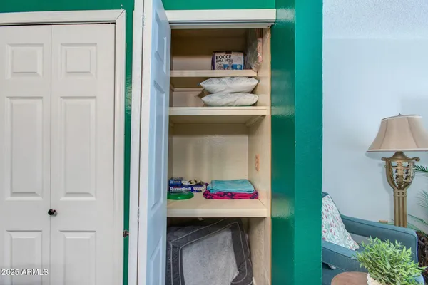 a kitchen with granite countertop cabinets stainless steel appliances and sink