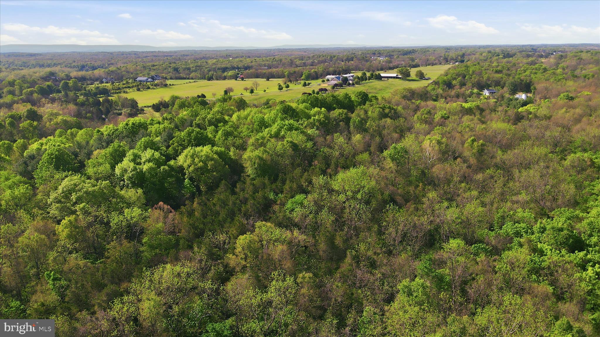 Carlyle Road Martinsburg, WV 25404 - Photo 3 of 6 an aerial view of a city with lots of residential buildings and green space