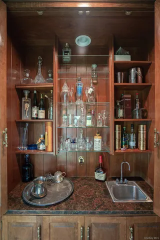 a kitchen with a table and chairs