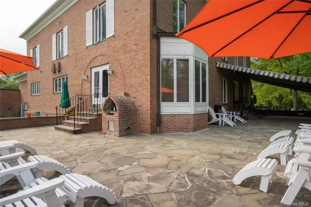 a view of a swimming pool with a garden