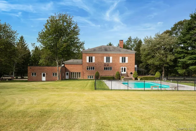 a view of a field with an ocean
