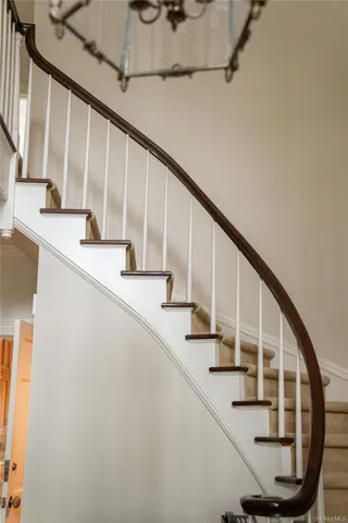 a big yard with lots of green space and trees