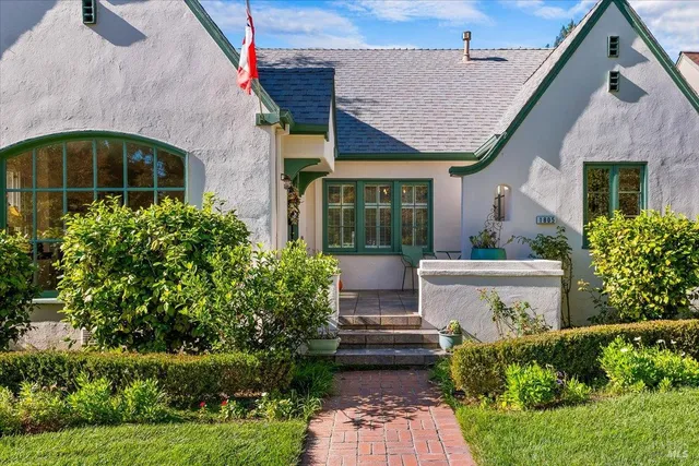 a view of a house with a garden