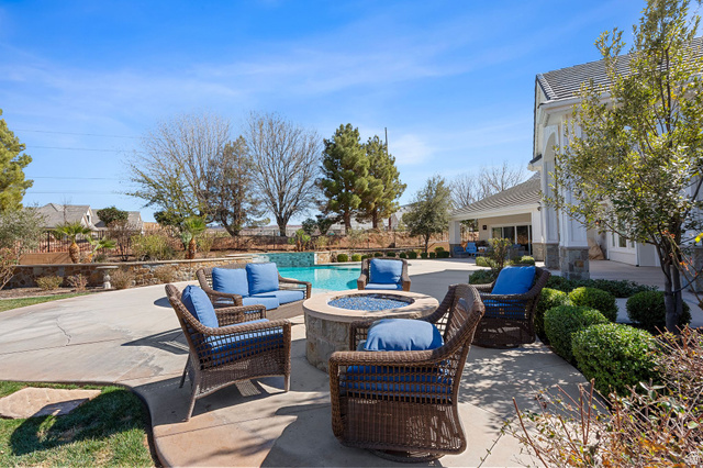 2917 Old Farm Road Washington, UT 84780 - Photo 48 of 105 View of patio with an outdoor living space with a fire pit