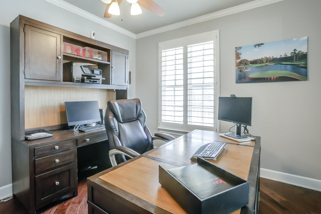 4712 121st Street Lubbock, TX 79424 - Photo 21 of 46 a work room with furniture and a window