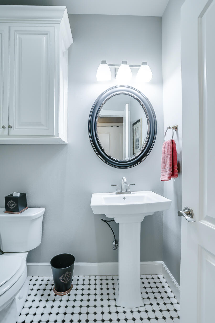4712 121st Street Lubbock, TX 79424 - Photo 28 of 46 a bathroom with a sink toilet and a mirror